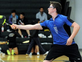 Pain Court's Kaylobe Derynck returns a shot during a boys doubles match Friday at the OFSAA badminton championship at St. Clair College's Thames Campus HealthPlex. (MARK MALONE/The Daily News)