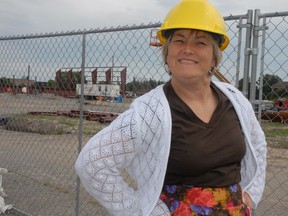 Donning a construction helmet, Liz Rossnagel surveys work on the new west-end community centre on Goulais Avenue in August 2011.