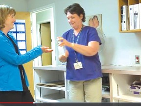 A screenshot from the Huron Perth Healthcare Alliance's Rub It In, Rub It In video shows local healthcare providers practicing good hand hygiene.