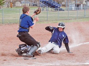 County Central High School Hawk Jourdan Jones stops a second Fort Macleod runner from stealing home Friday afternoon at the Virginia Mitchell Memorial Park ball diamonds, where the annual Star Trek Classic Baseball Tournament was held. A total of six teams came out to play.