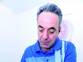 Darab Sobhani demonstrates the application of an acupuncture needle in one his treatment rooms. (DARCY CHEEK The Recorder and Times)