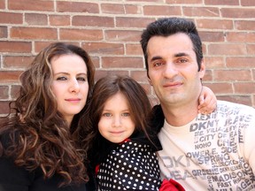 Ganimete Berisha, 29, left, and her husband Muhamet Bajraktari, 36, have worked since arriving in Canada in 2007, but worry about their future and that of their daughter, Eliza, as they face deportation to Kosovo. Photo take Sunday, May 5, 2013, in Chatham, Ont.

ELLWOOD SHREVE/ THE CHATHAM DAILY NEWS/ QMI AGENCY