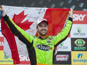 James Hinchcliffe of Canada celebrates after winning the IndyCar Series Sao Paulo Indy 300 on May 5, 2013 in the streets of Sao Paulo, Brazil. (Robert Laberge/Getty Images/AFP)