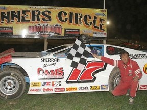 Steve Shaw celebrates in the winner's circle Saturday at South Buxton Raceway. (Contributed Photo)