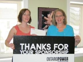 Tiffany Love, community and fund development coordinator of Women’s House, gratefully accepted a sponsorship cheque for $500 from Lynda Cain, senior communications advisor for OPG last Thursday (May 2, 2013).