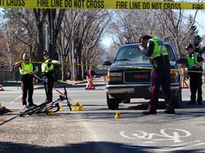 A 56-year-old cyclist — who was not wearing a helmet — has died after colliding with a pick-up in west Edmonton Friday morning.