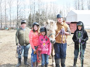 From left: Ryland Derocher, Sasha Martins, Kaylyn Coleman, Oliver (horse), Casey Littlejohn and Gabe Fransen from Percy Baxter School are part of a new Team for Success program that pairs up students with horses.
Barry Kerton | Whitecourt Star