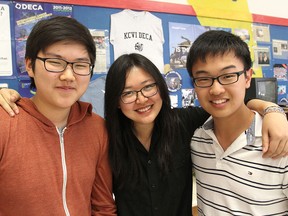 Brandon Lee, left, Maggie Shi and Kevin Zhang are members of a team from KCVI that won a prestigious international  business competition for high school students.
Michael Lea The Whig-Standard