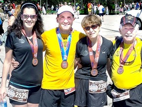 Contributed photo
The Chisholms, from left, Carrie, Todd, Dianne and Kent all completed the Mississauga half-marathon and marathon (Todd) races Sunday.