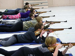 Sea and Army cadets hone their marksmanship skills at the indoor range.