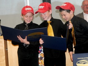 Quinte West recognized three Ontario Minor Hockey Association championship teams Monday. The Novices, Major Midgets and Juveniles all won provincial championships in March, with the Midgets adding the city's first Ontario Hockey Federation title since 1985. Novice players Kendrick Webster, Dylan Prinzen and Cole Kirby check out their certificates.
Ernst Kuglin Trentonian