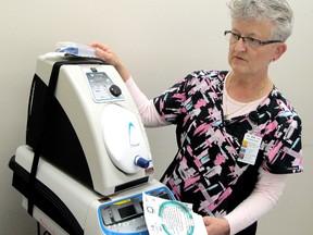 Chatham-Kent Health Alliance registered nurse Antoinette McGowan checks over a cautery machine in Ambulatory Care at the Chatham, Ontario campus during National Nursing Week on Tuesday May 7, 2013. (VICKI GOUGH, Chatham Daily News)