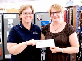 Big Brothers Big Sisters executive director Dawn Froese pictured with Sara Martens, assistant manager of the Portage MCC Thrift Store, during its second annual Big Brothers Big Sisters Day, Tuesday. A portion of the sales from the day wil go to support the non-profit. (ROBIN DUDGEON/THE GRAPHIC/QMI AGENCY)