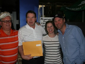 A presentation was made to the Banff Springs Junior Golf Program during a fundraiser at Aurora nightclub on Thursday, May 2, 2013. Joe Gregory, right, on behalf of “Eddie Cares Foundation” And Nicole Forshner each donated $1,000 to the trust and are pictured with, from left, David Swanson and Chris Lambe, Banff Springs Golf Club president. The evening raised more than $17,000. Photo submitted