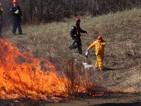 Regional Emergency Services conducted a controlled fire near Riedel Street Tuesday afternoon. RES plans controlled fires every spring to burn off large build-ups of dried leaves and grasses that are revealed once the snow melts, in order to reduce the risk of wildfires occurring. JORDAN THOMPSON