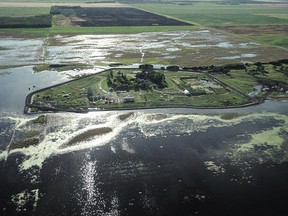 Joe Johnson’s farm was flooded in 2011 when water from the Portage Diversion was released into Lake Manitoba. Normally (inset photo taken in 2004), the lakeshore is more than a mile away. (LYDIA JOHNSON/Handout)