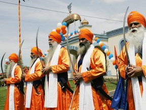 Members of the Brantford Sikh community march in last year's Khalsa Day parade. This year's parade begins at 2 p.m. Sunday at the Sikh temple at 483 Park Rd. N. (Expositor file photo)