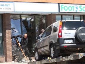 There were no reported injuries after a vehicle smashed into the front of Foot Solutions at the Montrose Mall on Lasalle Boulevard in Sudbury, ON. on Tuesday, May 7, 2013. The collision happened around 2 p.m. JOHN LAPPA/THE SUDBURY STAR/QMI AGENCY