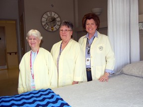 Volunteers with the palliative care program at Tillsonburg District Memorial Hospital from left; Lorraine Mountford, Elaine Hallett and Bonnie Phillips, stand inside one of two palliative care rooms. May 5 - 11, 2013 is Palliative Care Week, helping raise awareness about palliative care and the important role volunteers play in the program and in the community. 

KRISTINE JEAN/TILLSONBURG NEWS/QMI AGENCY