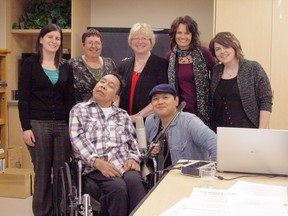 Erin Steele/R-G
It was an exceptional birthday part last Tuesday (April 30) for Jonas (pictured middle), who is paraplegic (left/front in photo). Jonas, who currently lives in long-term care in High Level loves singing and has been asking for a long time to record his songs. Because of this group of people surrounding him, that happened last week. It also just happened to be his birthday. (from left, moving clockwise) Olivia Organ (recreational therapist in High Level), Wendy Mercereau (long-term care co-ordinator in High Level), Sandi BÈlanger (knew Jonas from when he was in Peace River), Dana Blayone and Sherry Crawford (from No Limitz who co-ordinated the session) and Earl Pereira, a producer/musician who happened to be in town for the songwriterís workshop and playing with his band The Steadies at the underground.