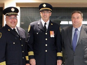 Fire Chief Mike Pichor, Deputy Chief Henry Girard, Mayor Mike Lehoux, Wayne Ashton and Mark Deary of the Ontario Fire Marshal’s Office all were on hand to celebrate the many years of service for the Espanola Fire Department members. Photo by Dawn Lalonde/Mid-North Monitor/QMI Agency