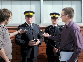 Grande Prairie RCMP Supt. Ray Noble (left) and Cpl. Roy Kennedy brief local media on the details of an armed standoff that began yesterday and went into the early morning hours. The incident included a car chase between the suspect and RCMP and resulted in the man locking himself inside of a rural residence just east of the city. The name of the 24-year-old suspect is being withheld until his charges are sworn in later this afternoon.  Grande Prairie, Alberta Wednesday May 8, 2013 KIRSTEN GORUK/DAILY HERALD-TRIBUNE/QMI AGENCY