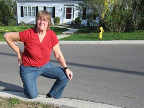 Simcoe homeowner Christine Fair is upset after Norfolk County Council backtracked on  earlier approval to re-sod sections of her property on Groff Street.  (MONTE SONNENBERG Simcoe Reformer)