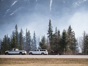 Smoke still surrounds portions of the Trans-Canada Highway west of the Banff National Park gates as a controlled burn takes place in the Carrot Creek region of the park on Tuesday, May 7, 2013. Justin Parsons/ Canmore Leader