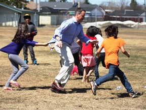 MP Rickford takes part in some outdoor games with some of the young evacuees in Kapaskasing.