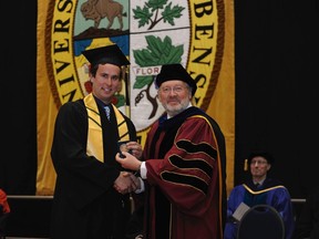 Tanner Nicoll of MacGregor receives the President's Medal from University of Manitoba Vice-Provost David Collins during the School of Agriculture's graduation held on May 3. The President's Medal is awarded to an Agricultural Diploma student who combines scholarship with outstanding qualities of leadership. (SUBMITTED PHOTO)