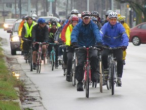 A group of cyclists ride in memory of the late Denis Ross, in this Observer file photo. Since the death of the 61-year-old Sarnia cyclist in 2011, local advocates have been pushing for cycling infrastructure reform, and a number of groups have joined forces to raise awareness about cycling safety. (The Observer)
