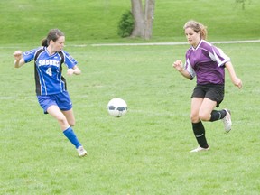 MONTE SONNENBERG Simcoe Reformer
Melissa Birkinshaw, left, of Simcoe Composite School, and Shanaya Armstrong of Valley Heights vie for the ball during a regular season match Wednesday in Simcoe. The lady Bears came out on top 2-1.