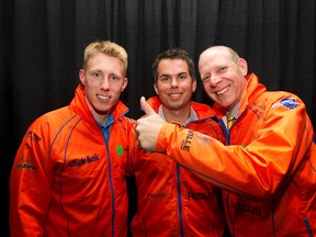 Dave Nedohin, centre, poses with new skip Kevin Martin, right, and new teammate Marc Kennedy. (Amber Bracken, Edmonton Sun)