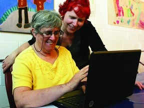 H’art instructor Toni Thornton (right) works with student Lori Allum who took part in a unique opportunity with the Faculty of Education at Queen’s University. Through the Inclusive Post-Secondary Education Initiative, H’art participants work toward a five-year Certificate of Learning at the university.    ROB MOOY - KINGSTON THIS WEEK