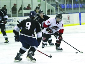 Joey Morin (white) was recently named CJHL rookie of the year by league’s coaches. File Photo.