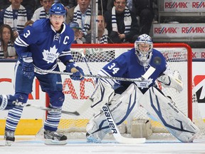 Leafs captain Dion Phaneuf next to goalie James Reimer in Game 3 of the 2013 first-round playoff series with the Boston Bruins. (Toronto Sun file photo)