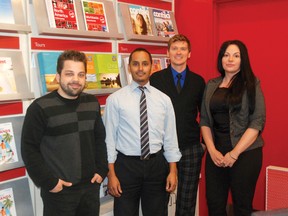 Flight Centre employees David Krymusa, Enver Naidoo, James Bradley and Michelle Neufeld are working at the international travel agency's new Grande Prairie location. The store opened on May 1 and is located in Prairie Mall. Grande Prairie, Alberta. Tuesday, May 7, 2013 KIRSTEN GORUK/DAILY HERALD-TRIBUNE/QMI AGENCY