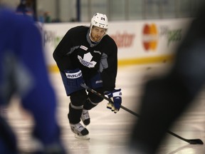 Leafs defenceman John-Michael Liles digs in at the MasterCard Centre during an optional skate on Thursday. Liles draws back into the lineup for Game 5 in Boston on Friday. (Craig Robertson, Toronto Sun)