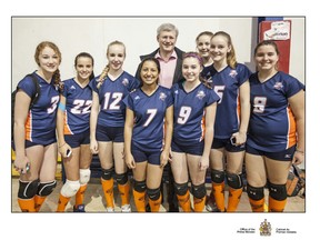 Prime Minister Stephen Harper poses with the Brant Tornadoes under-14 girls team at the Ontario Volleyball Tournament in Waterloo. With the PM are Kailee Cherewka (left), Sam Poloniato, Baillie Sanderson, Ipsita Kalsi, Braelyn Knowles, Brenley Morgan, Sophie Southall and Andrea Webster