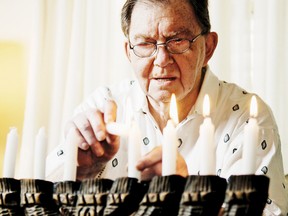 Mark Goldhamer demonstrates how to light a menorah in this 2006 file photo. Goldhamer, who died on Sunday, was a dedicated volunteer and one of Cornwall’s most prominent members of the Jewish community.
File photo