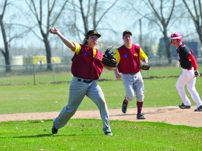Adam Blight of the PCI Trojans makes a throw to first during a May 9 doubleheader against Garden Valley. (Kevin Hirschfield/THE GRAPHIC/QMI AGENCY)