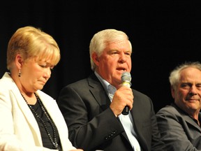 Andy Bouvier, father of stabbing victim Julie Bouvier, speaks to the audience after a screening of the film 'NCR: Not Criminally Responsible,' at the Brockville Arts Centre Thursday night. To his left is his wife Noella. To his right is the film's direcror, John Kastner. RONALD ZAJAC The Recorder and Times