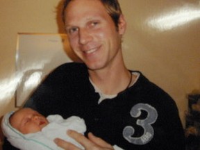 Sharlene Bosma begged for the safe return of her husband, Tim, at a press conference in Hamilton on Thursday, May 9, 2013. Here Tim is posing with his daughter, who is now two years old. (Photo courtesy the Bosma family)