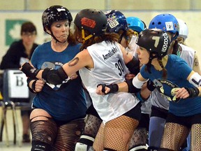 Stratford's Decapulettes contact roller derby team takes on Peterborough's Area 705 in Milverton. (SCOTT WISHART The Beacon Herald)