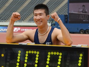 Japanese sprinter Yoshihide Kiryu clinches his fists after clocking 10.01 seconds last month. (AFP)