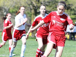 Erica Seeley, of the West City Honda U15 girls Comets, moves the ball forward during action against Grimsby at the annual Oshawa Kicks tournament held recently in Oshawa.