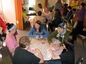 Playing cards doesn’t really take their minds off their hungry stomachs but it helps pass the time for 30 Hour Famine participants during the 2012 event.
MINER and NEWS file photo
