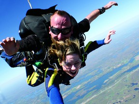 Recorder and Times reporter Alanah Duffy and Skydive Gananoque instructor Serge Blouin jump tandem. Duffy took her mother skydiving for a Mother's Day outing. (SKYDIVE GANANOQUE Photo)