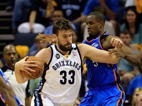 Marc Gasol (33) of the Memphis Grizzlies drives past Kendrick Perkins of the Oklahoma City Thunder during Game 3 of the NBA Western Conference semifinals at FedExForum on May 11, 2013 in Memphis. (Jamie Squire/Getty Images/AFP)