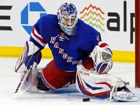 New York Rangers goalie Henrik Lundqvist makes a save during Game 6 of the NHL Eastern Conference quarterfinals against the Washington Capitals at Madison Square Garden in New York, May 12, 2013. (REUTERS/Adam Hunger)